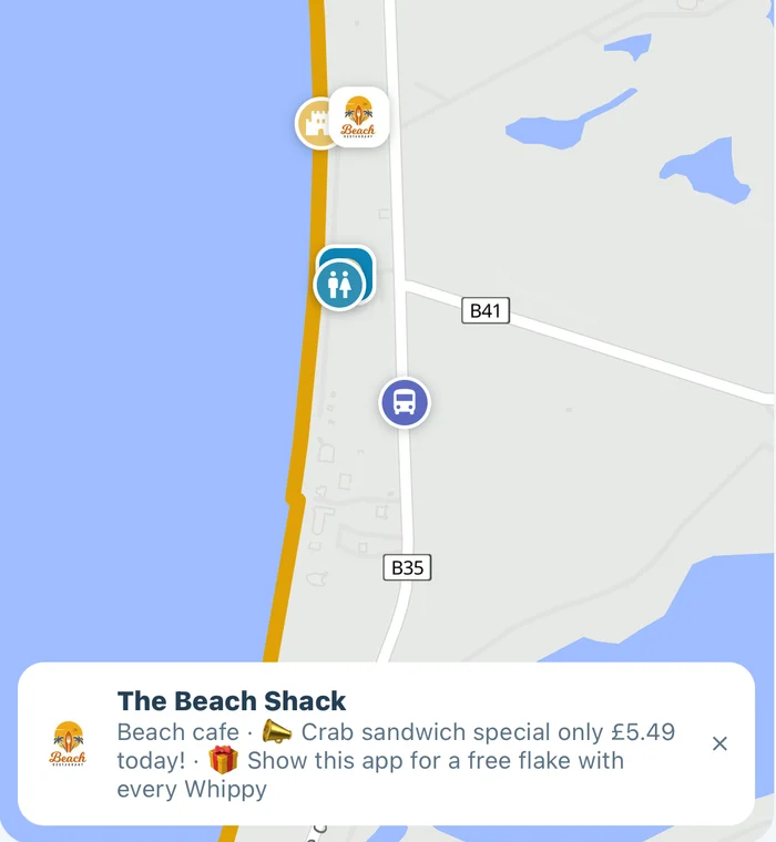 A trader's pin on the island map, showing their logo